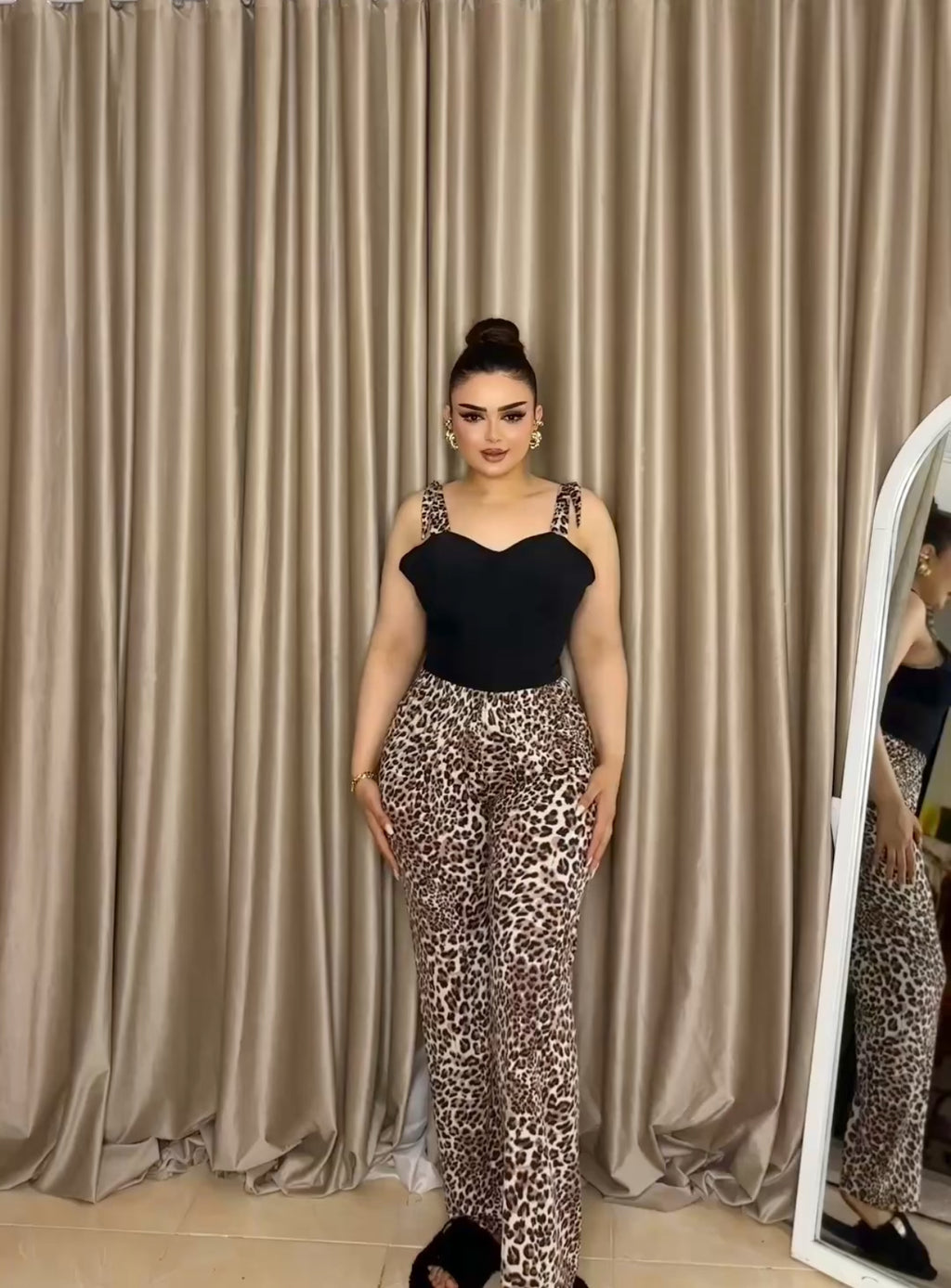 “Black pajamas with tiger print”