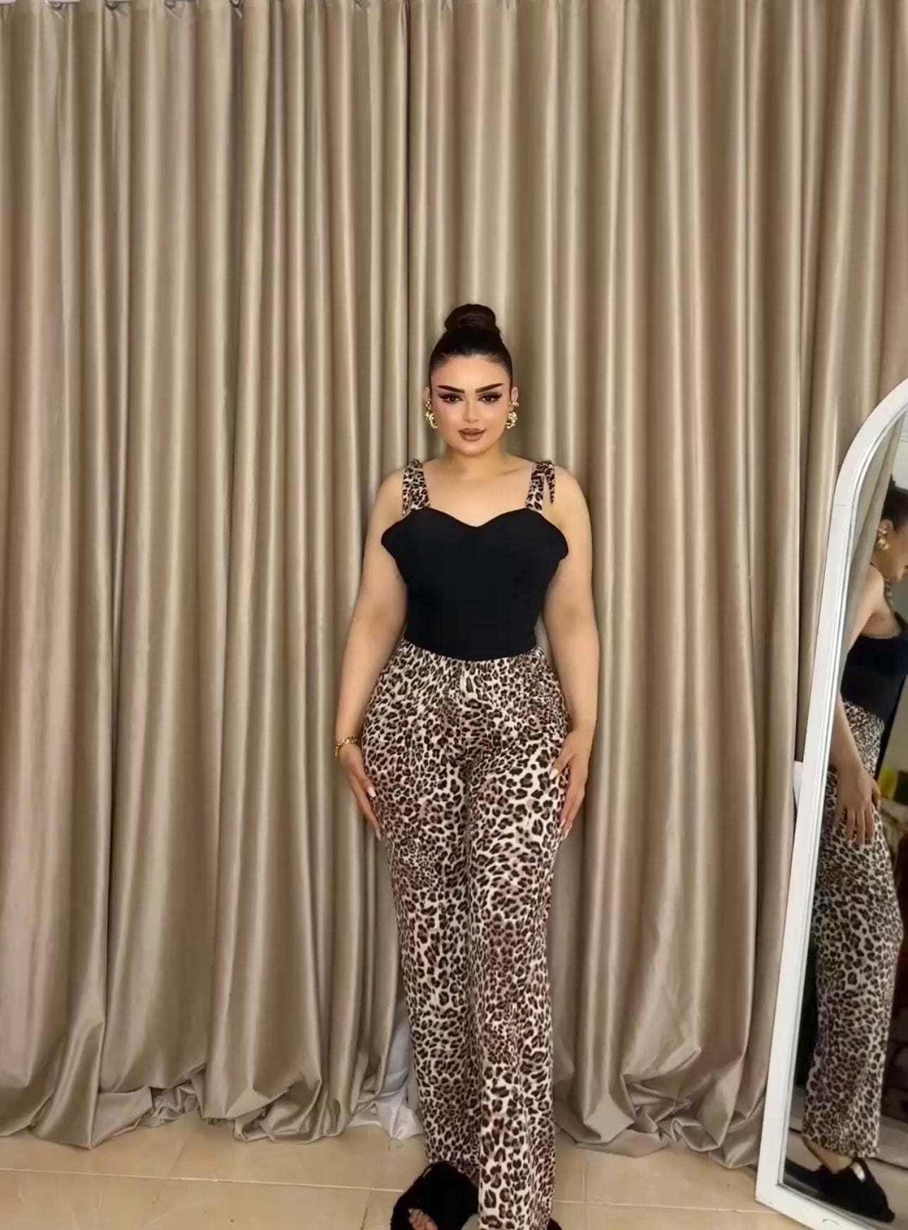 “Black pajamas with tiger print”