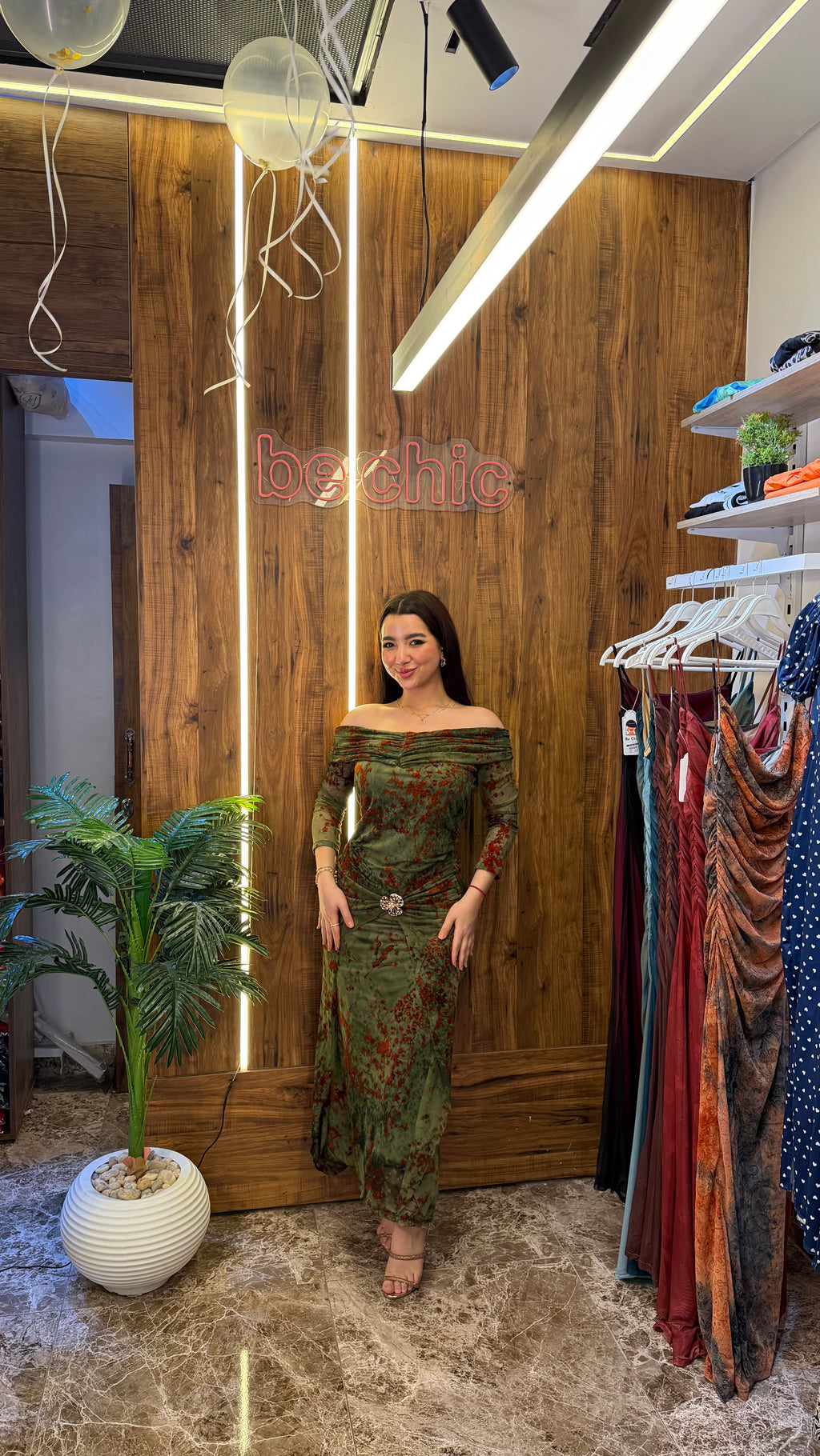 “Olive green tulle dress with orange floral print”