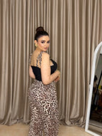 “Black pajamas with tiger print”