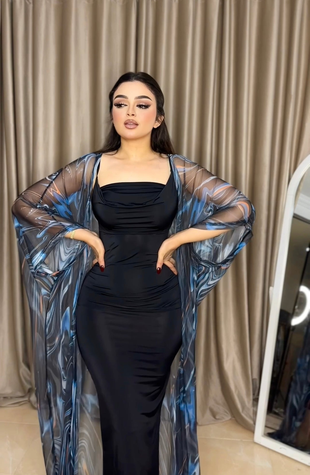 Black cash with sea wave robe